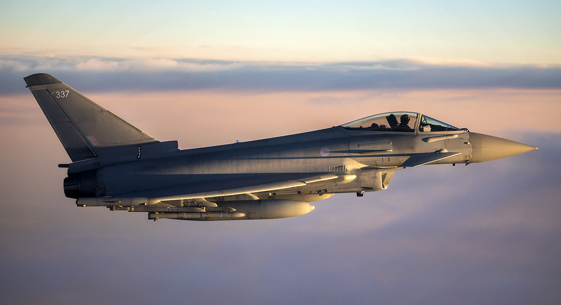 Image shows a RAF Lightning in flight above the clouds.